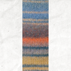 A yarn swatch showing the self striping pattern of the blue, grey, orange, and yellow tones.