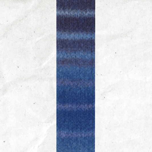 A yarn swatch showing the self striping pattern of the blue and purple tones.