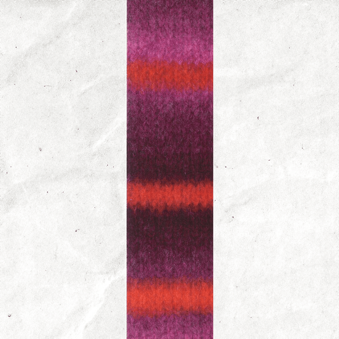 A yarn swatch showing the self striping pattern of the pink, purple, and red tones.