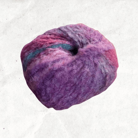A fluffy ball of yarn with pink, purple, and green tones.