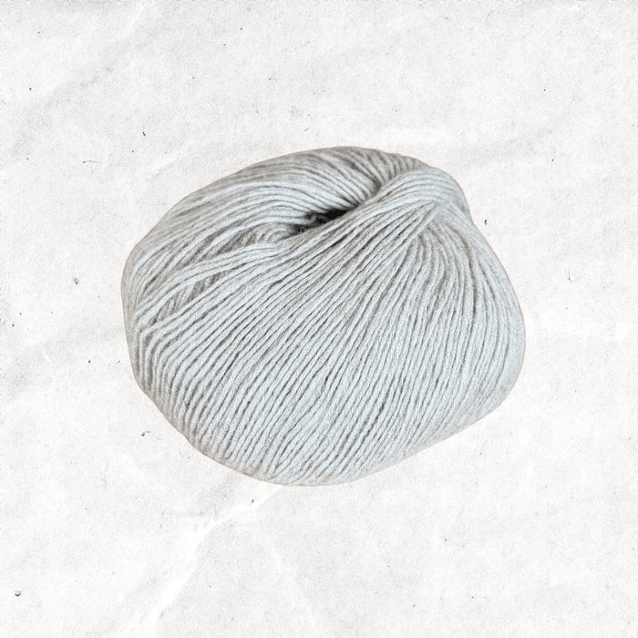 Light grey ball of yarn.