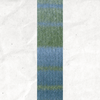A yarn swatch showing the self striping pattern of the baby blue and light green tones.