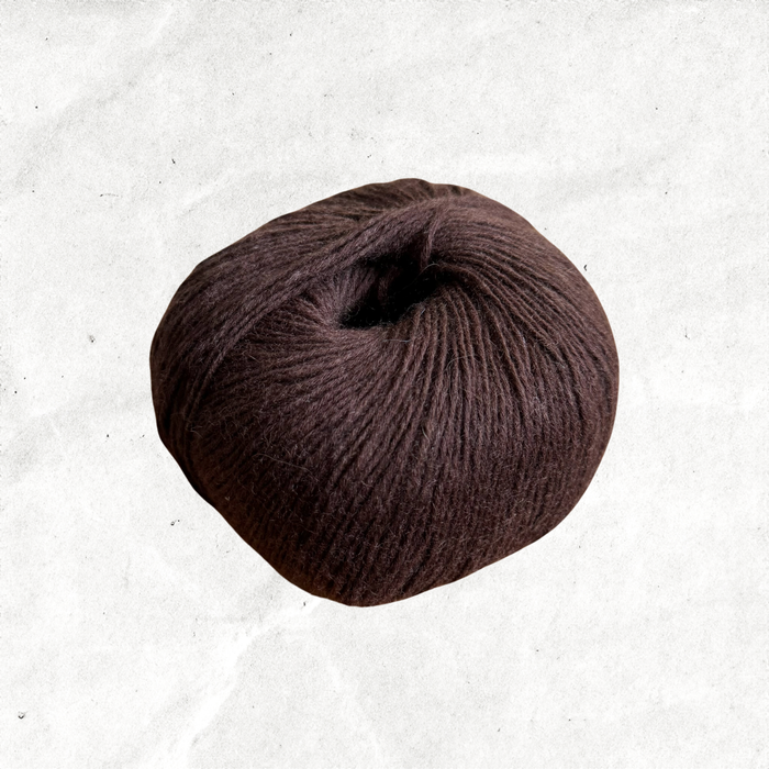 Warm dark brown ball of yarn.