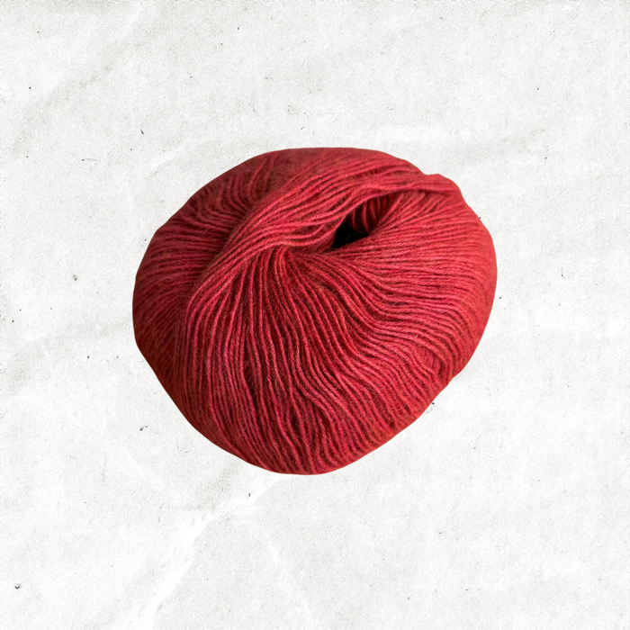 Red ball of yarn.
