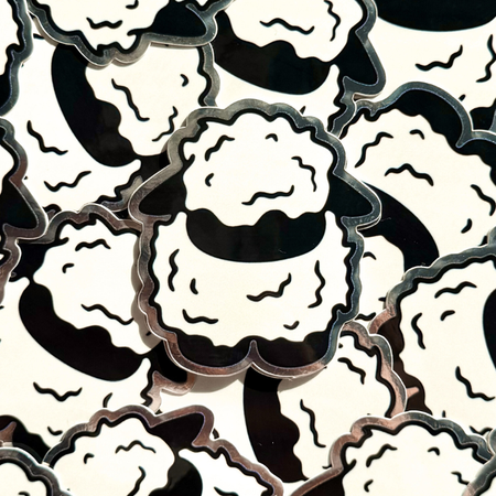 Collage of a black and white sheep sticker.